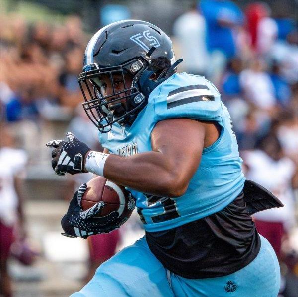 GVSU sophomore running back Khalil Eichelberger runs against Central State at Lubbers Stadium on September 5.